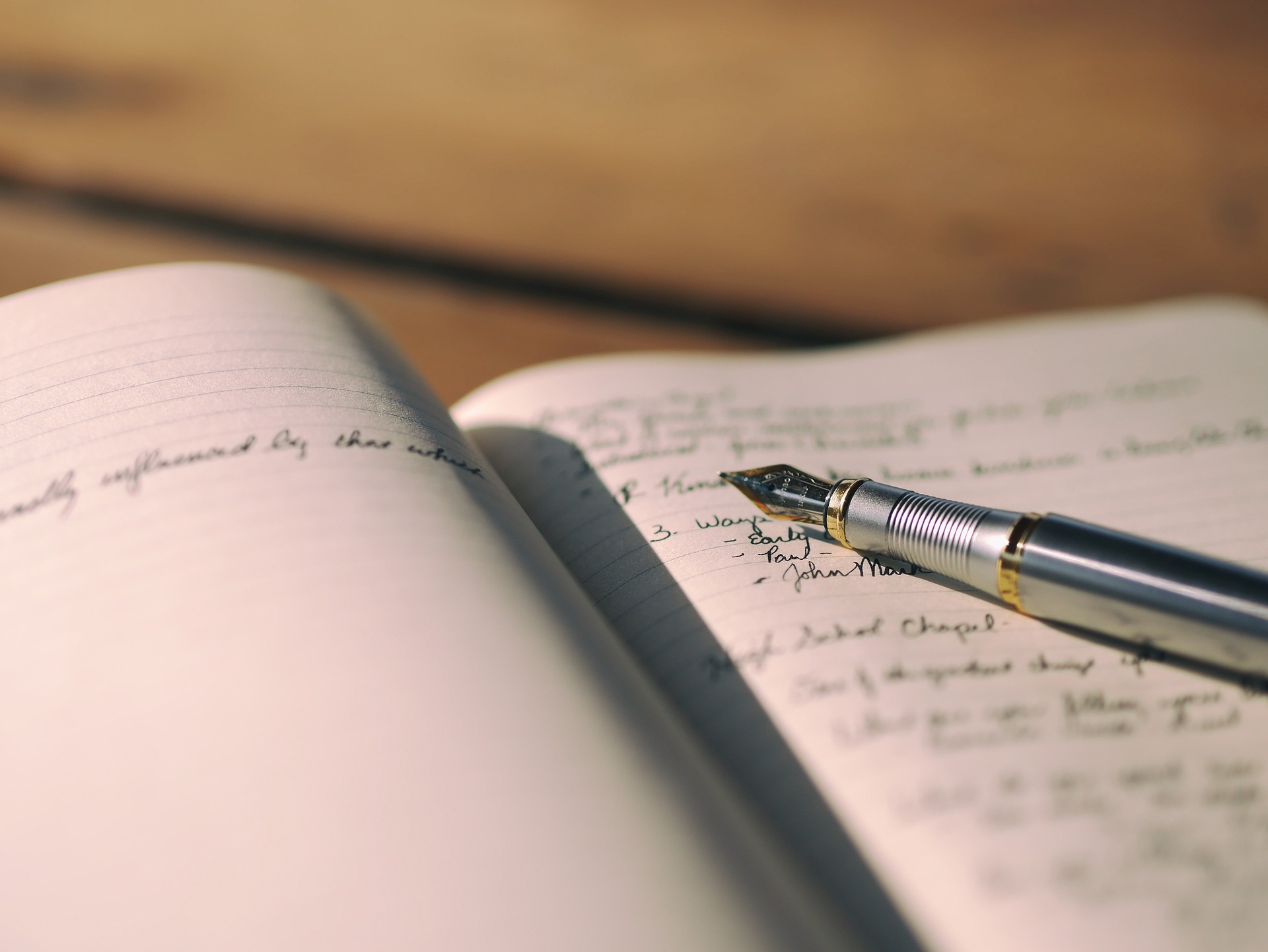 A person reflecting and journaling about their day before going to sleep.
