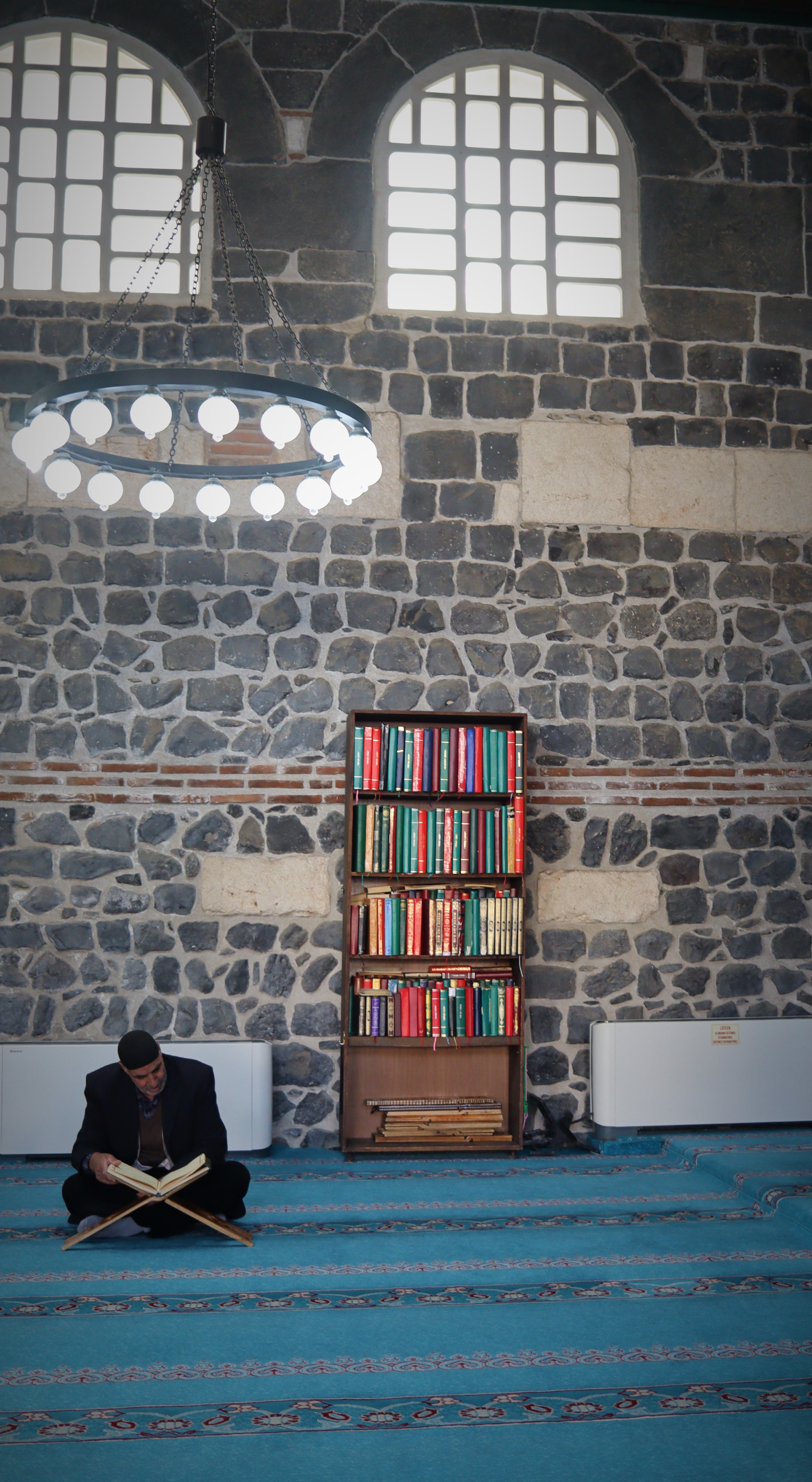 Reading the Quran during fasting for spiritual discipline.